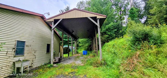 a view of a house with a big yard