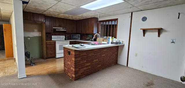 a utility room with cabinets