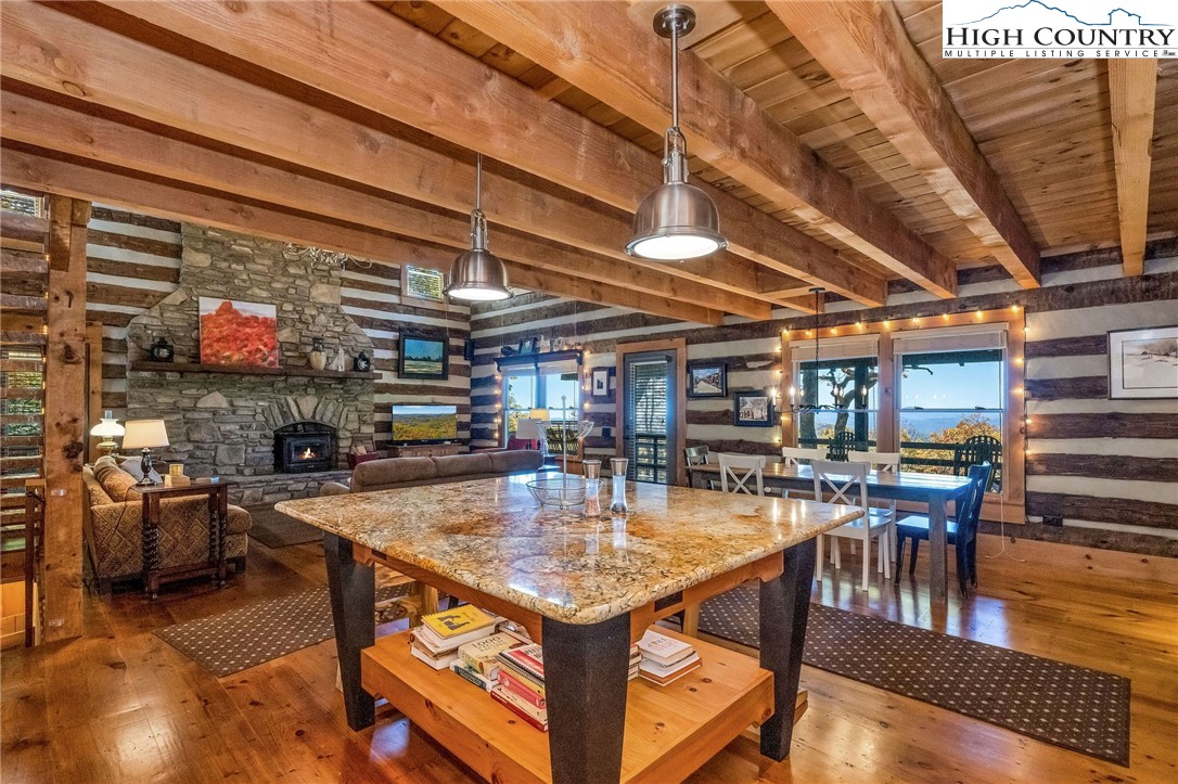 1810 Homestead Road Todd, NC 28684 - Photo 13 of 50 a view of a chairs and table in a patio