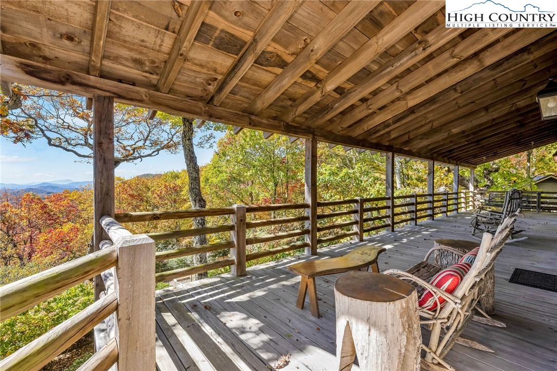 1810 Homestead Road Todd, NC 28684 - Photo 20 of 50 a balcony with wooden floor