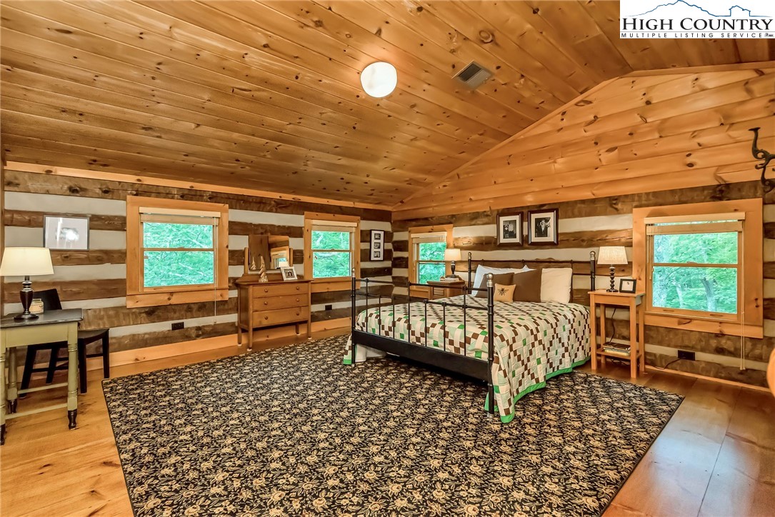 1810 Homestead Road Todd, NC 28684 - Photo 32 of 50 a bedroom with furniture and window