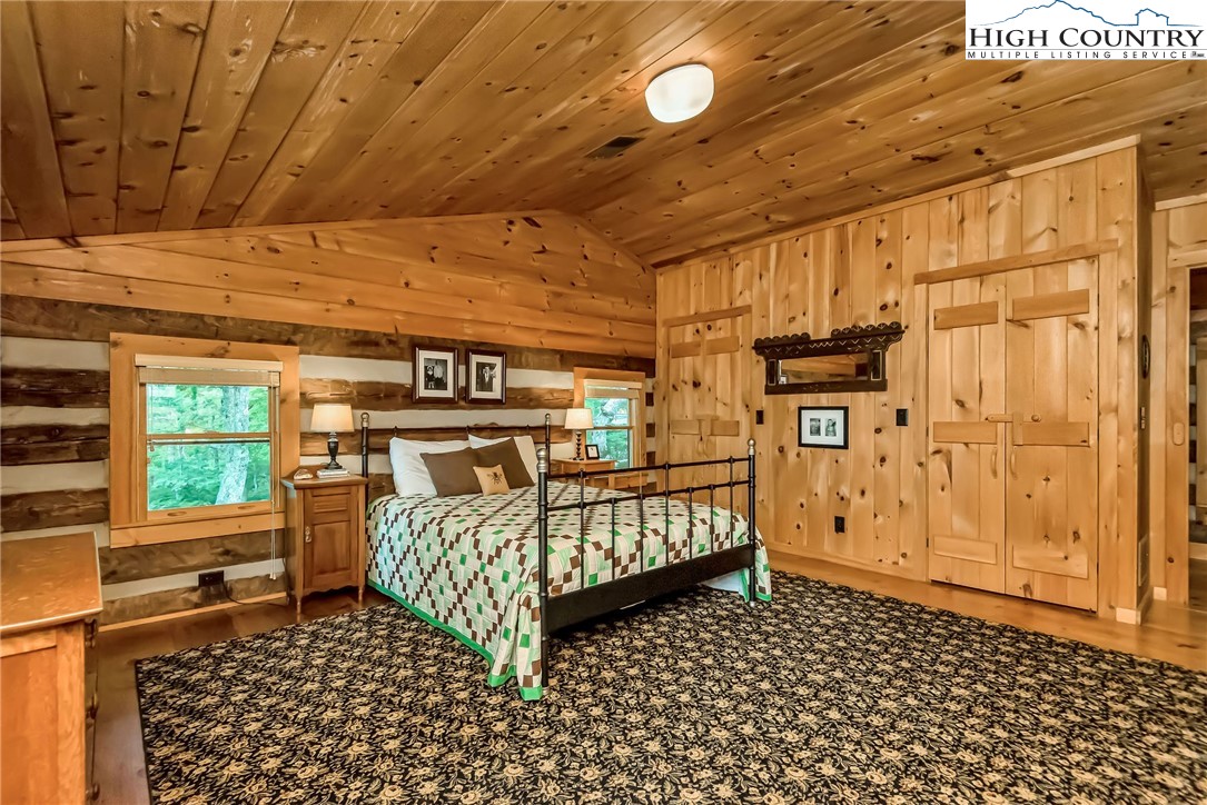 1810 Homestead Road Todd, NC 28684 - Photo 33 of 50 a bedroom with furniture and window