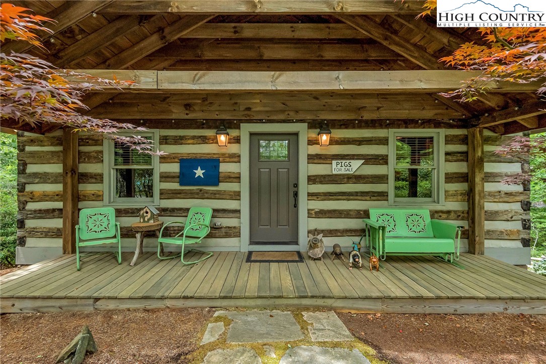 1810 Homestead Road Todd, NC 28684 - Photo 43 of 50 a view of a chairs and table in the patio