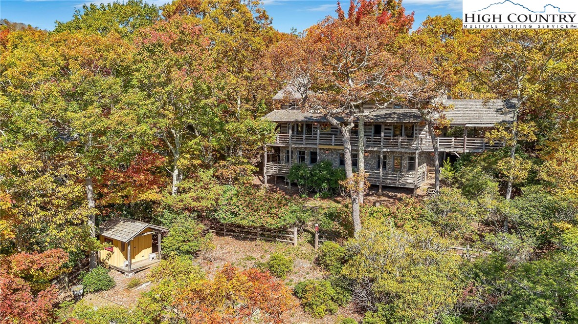 1810 Homestead Road Todd, NC 28684 - Photo 48 of 50 a view of a house with a tree in the background