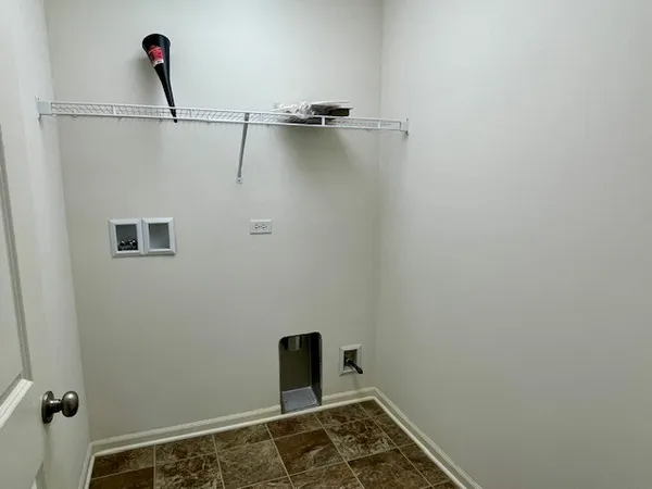 a view of a room with rack on the wall