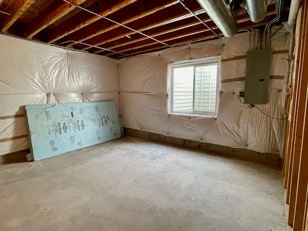 a room with table and chairs
