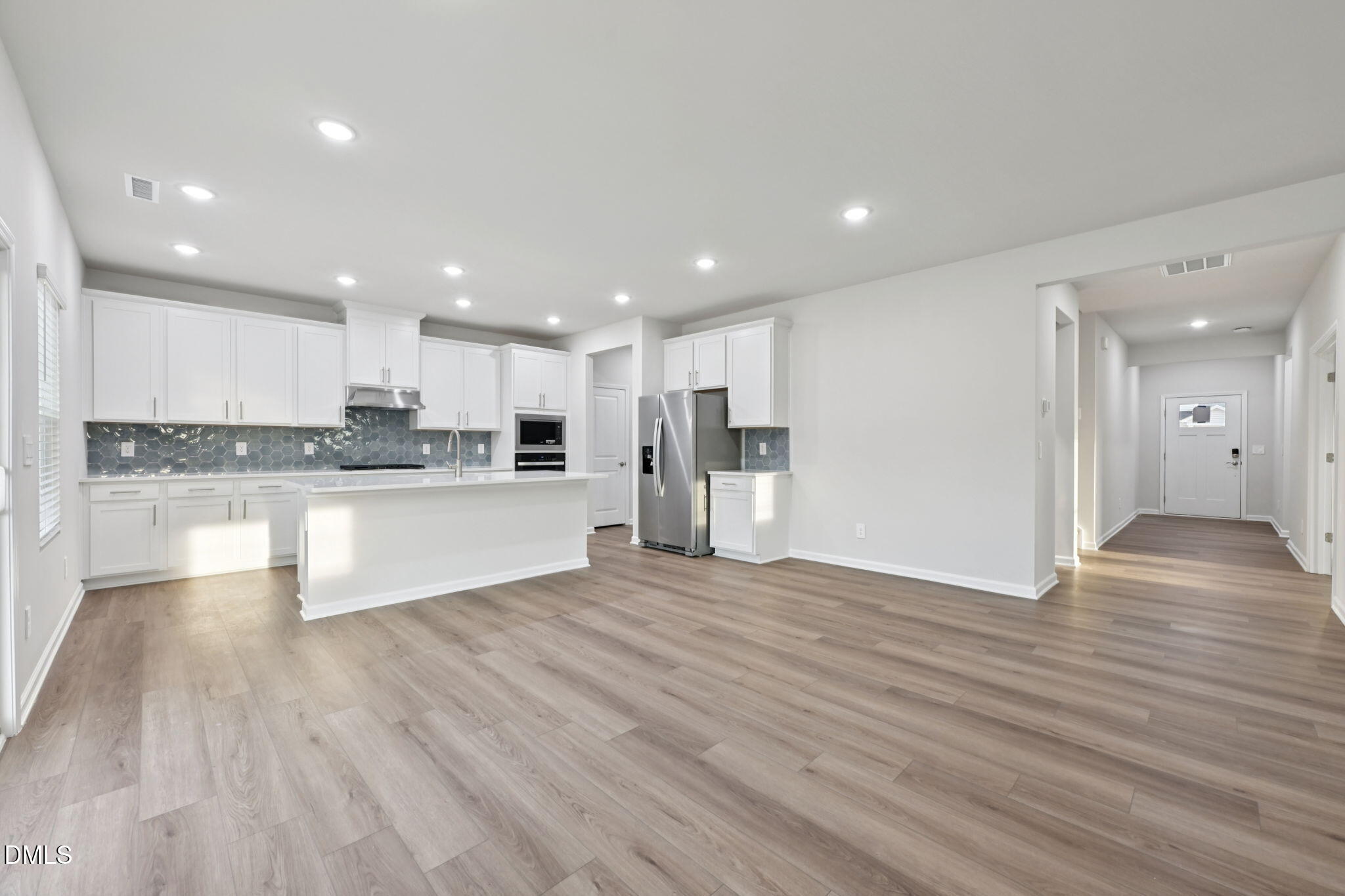 548 Bridger Drive Garner, NC 27529 - Photo 12 of 49 a view of kitchen with wooden floor