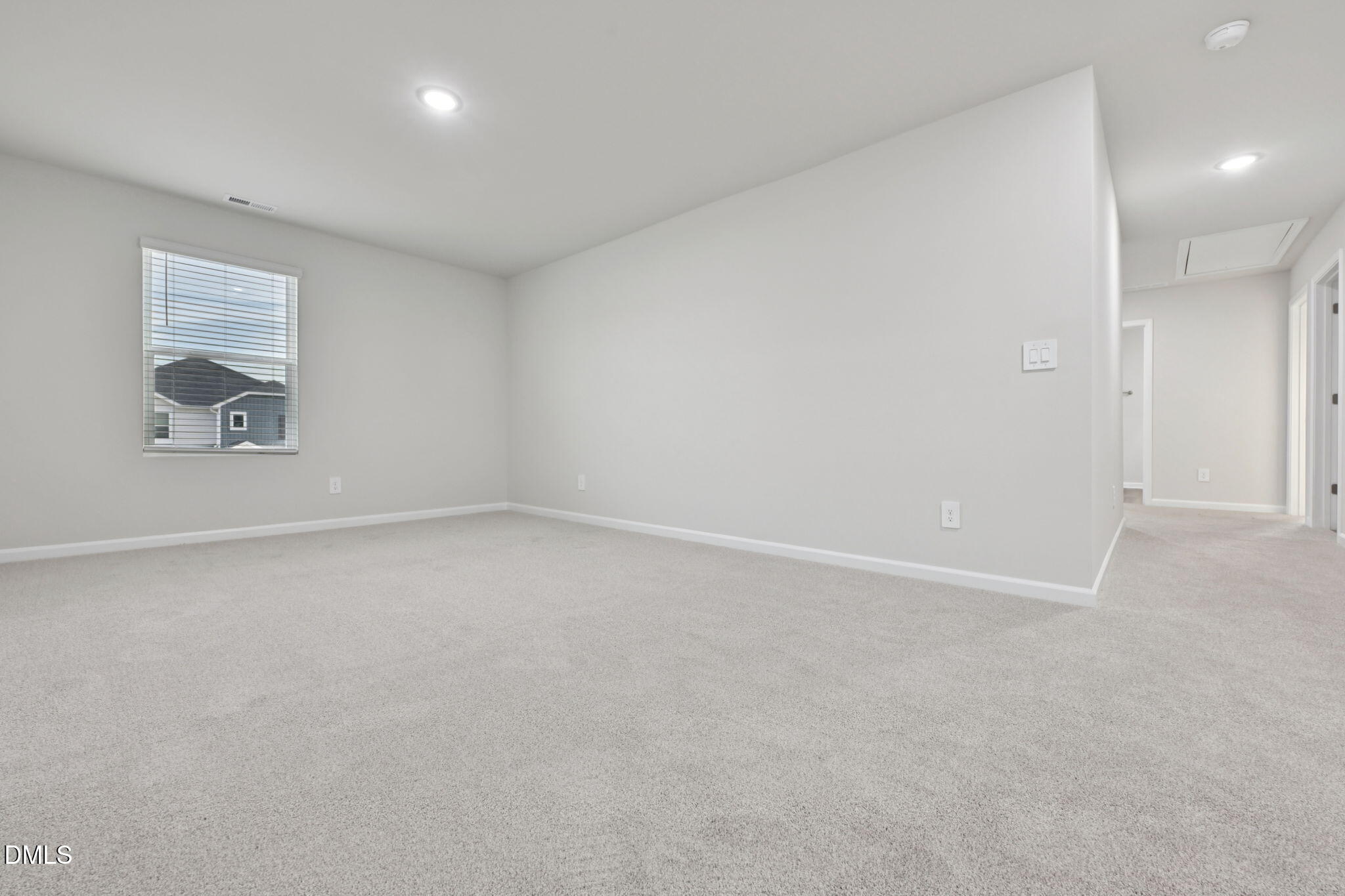 548 Bridger Drive Garner, NC 27529 - Photo 24 of 49 an empty room with a empty space and window