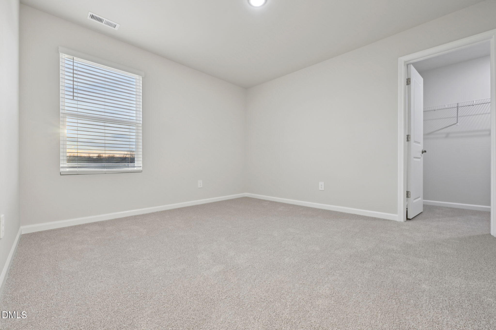 548 Bridger Drive Garner, NC 27529 - Photo 25 of 49 an empty room with a window