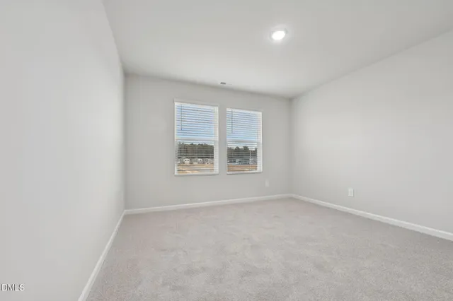 an empty room with an entryway
