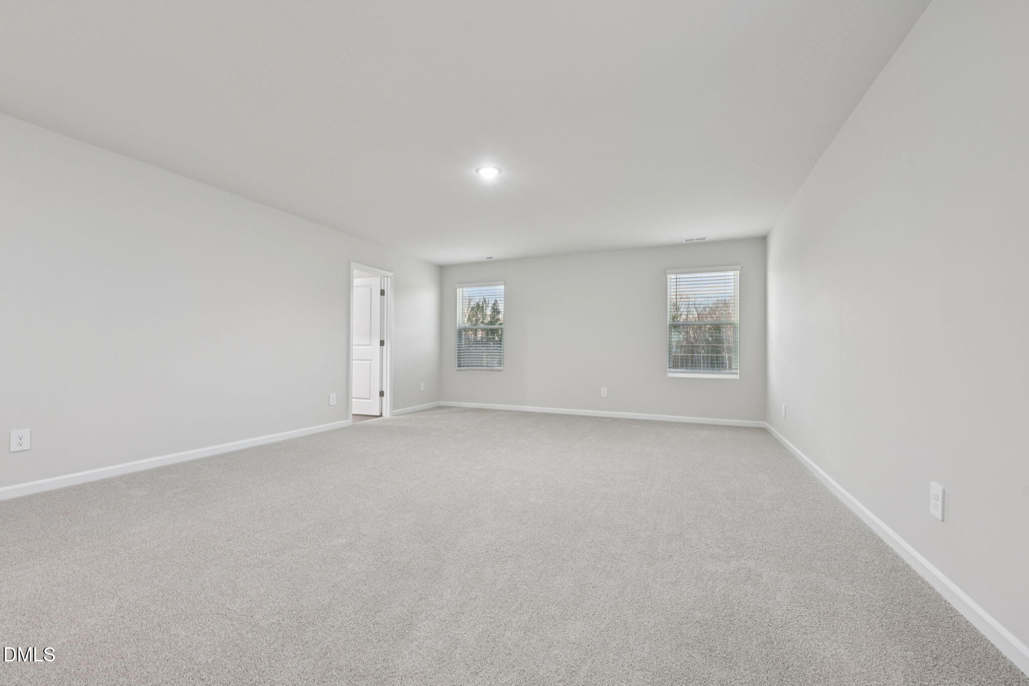 548 Bridger Drive Garner, NC 27529 - Photo 30 of 49 an empty room with windows