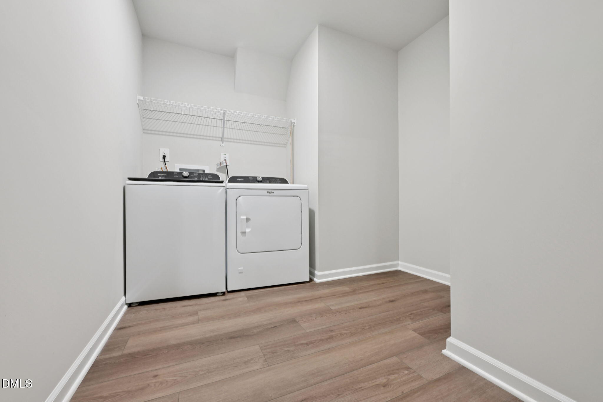 548 Bridger Drive Garner, NC 27529 - Photo 37 of 49 a view of a room with rack on the wall