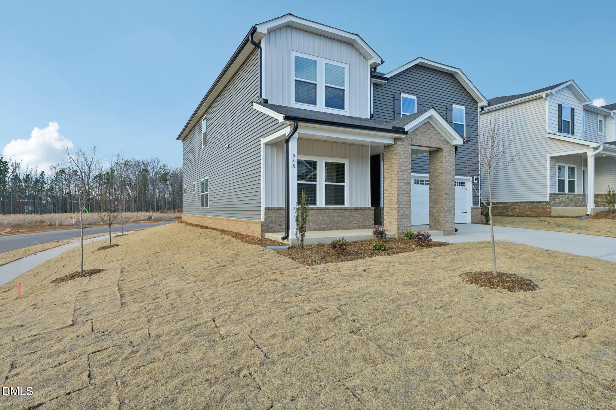 548 Bridger Drive Garner, NC 27529 - Photo 3 of 49 a view of a house with a dry yard