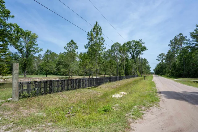 a view of a backyard with a small cabin