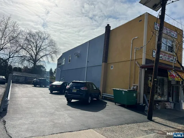 a car parked in front of a house
