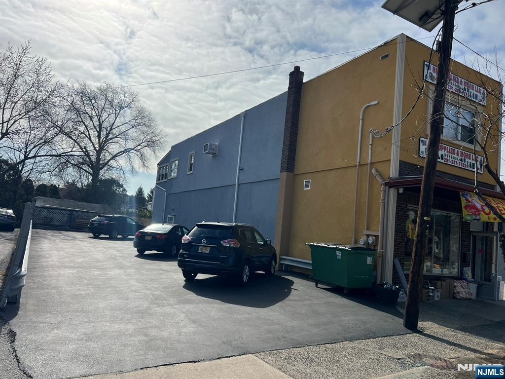 460 Boulevard Hasbrouck Heights, NJ 07604 - Photo 2 of 11 a car parked in front of a house