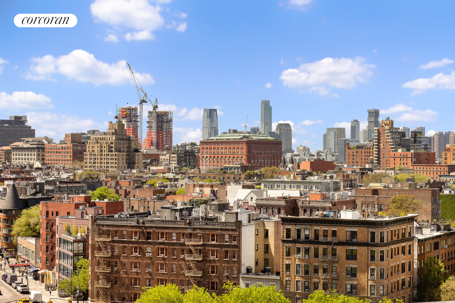 a view of a city with tall buildings