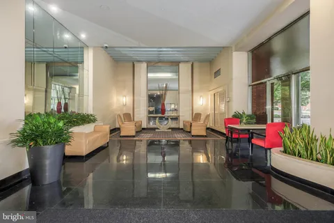 a view of a living room and dining room