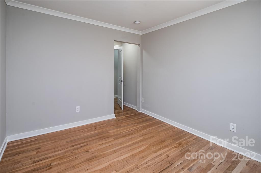 3532 Clardy Court Charlotte, NC 28205 - Photo 21 of 34 a view of an empty room with wooden floor