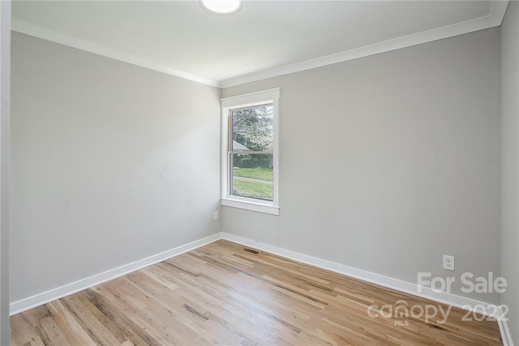 3532 Clardy Court Charlotte, NC 28205 - Photo 22 of 34 a view of empty room with wooden floor