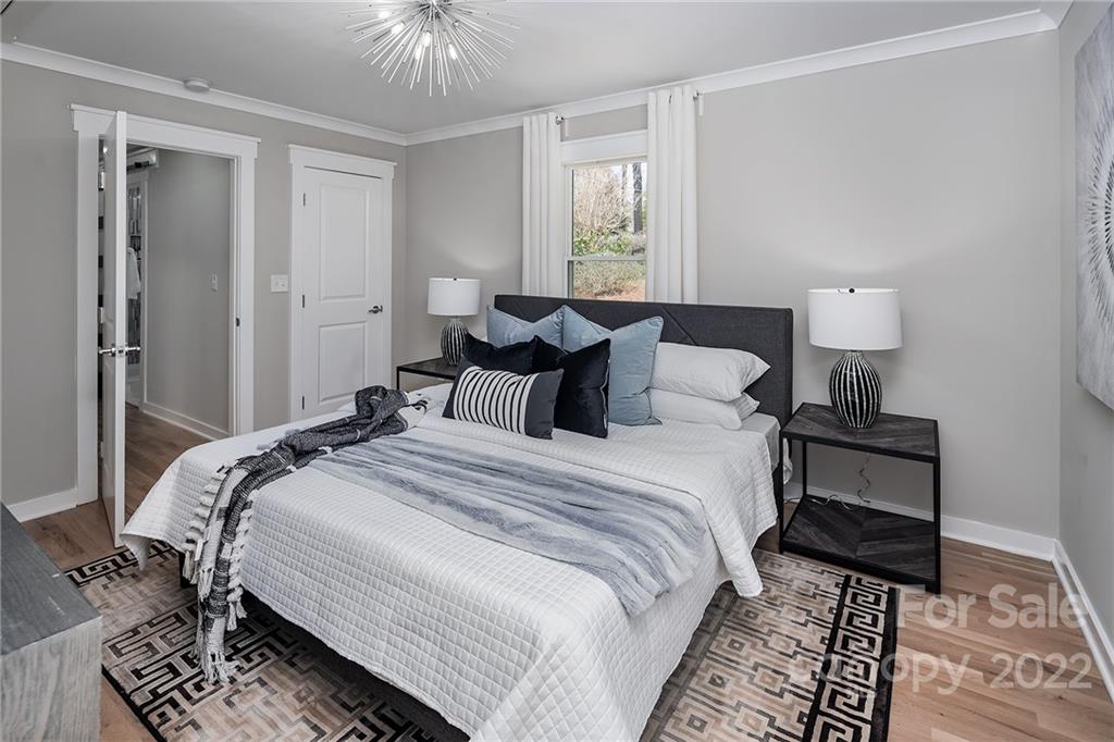 3532 Clardy Court Charlotte, NC 28205 - Photo 26 of 34 a bedroom with bed and a window