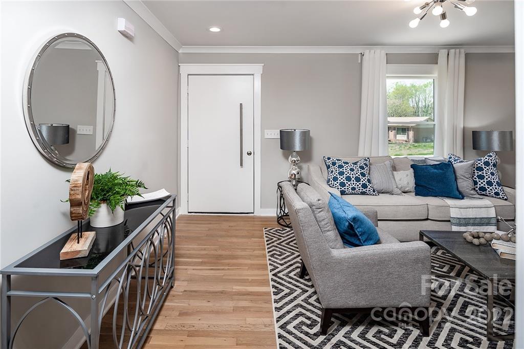 3532 Clardy Court Charlotte, NC 28205 - Photo 6 of 34 a living room with furniture and a wooden floor