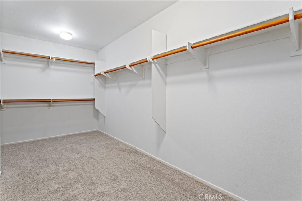 1128 East E Avenue Lancaster, CA 93535 - Photo 26 of 37 a view of an empty walk in closet