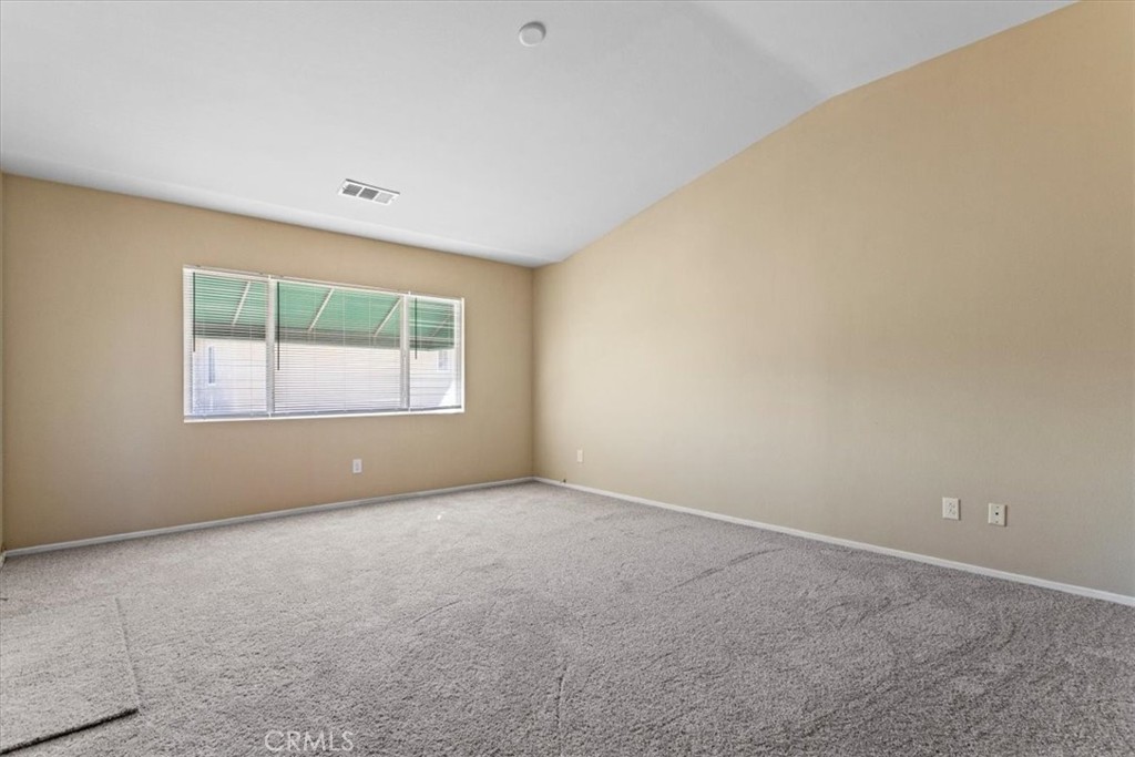1128 East E Avenue Lancaster, CA 93535 - Photo 28 of 37 an empty room with windows