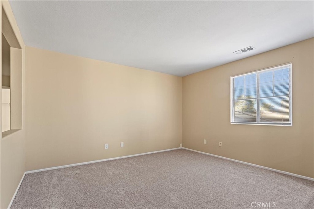 1128 East E Avenue Lancaster, CA 93535 - Photo 29 of 37 an empty room with windows