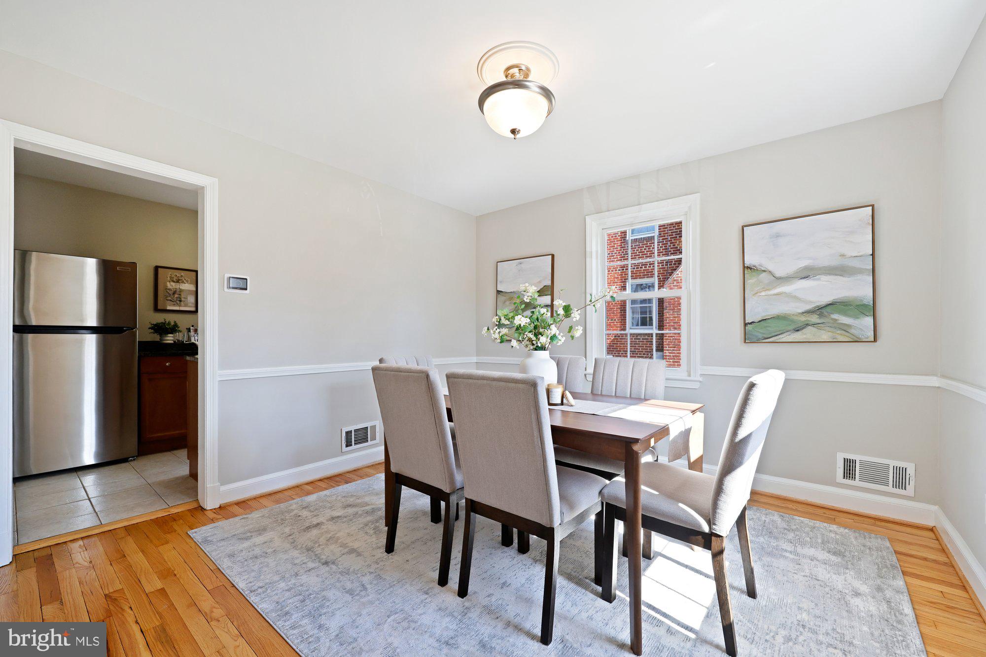 2613 Elnora Street Silver Spring, MD 20902 - Photo 11 of 54 a view of a dining room with furniture