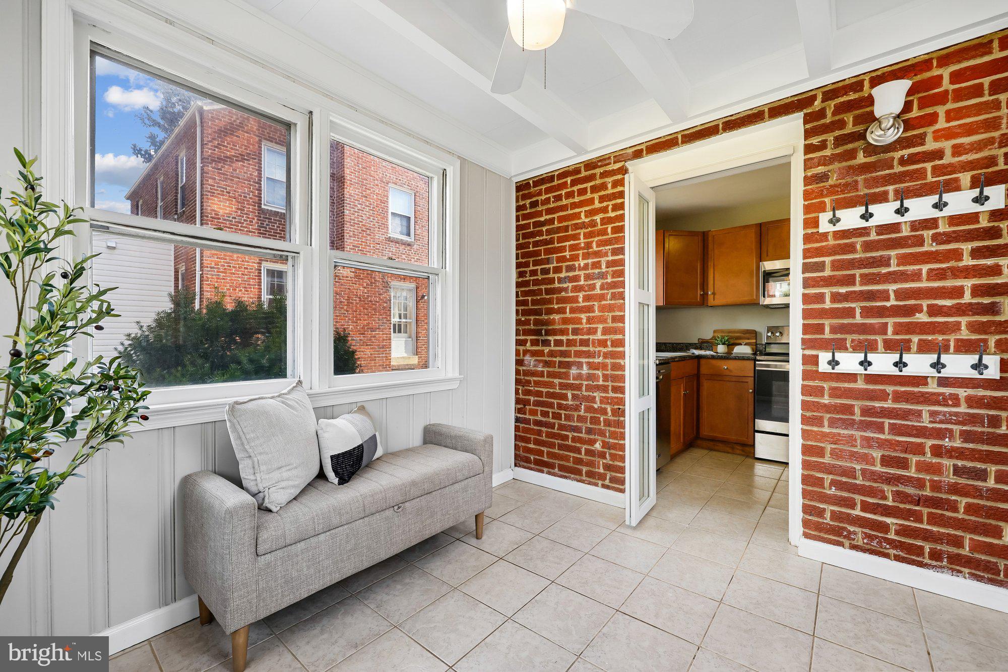 2613 Elnora Street Silver Spring, MD 20902 - Photo 17 of 54 Charming Sun Room with brick accents.