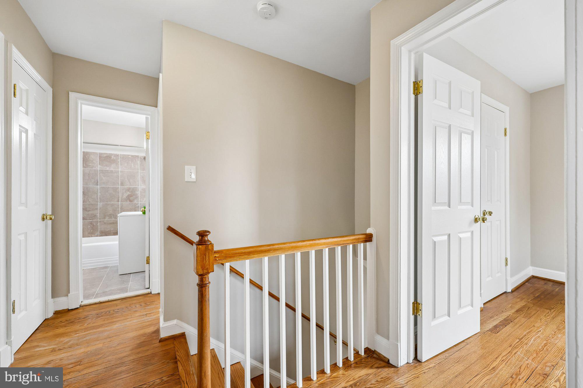 2613 Elnora Street Silver Spring, MD 20902 - Photo 19 of 54 a view of a hallway with wooden floor and entryway