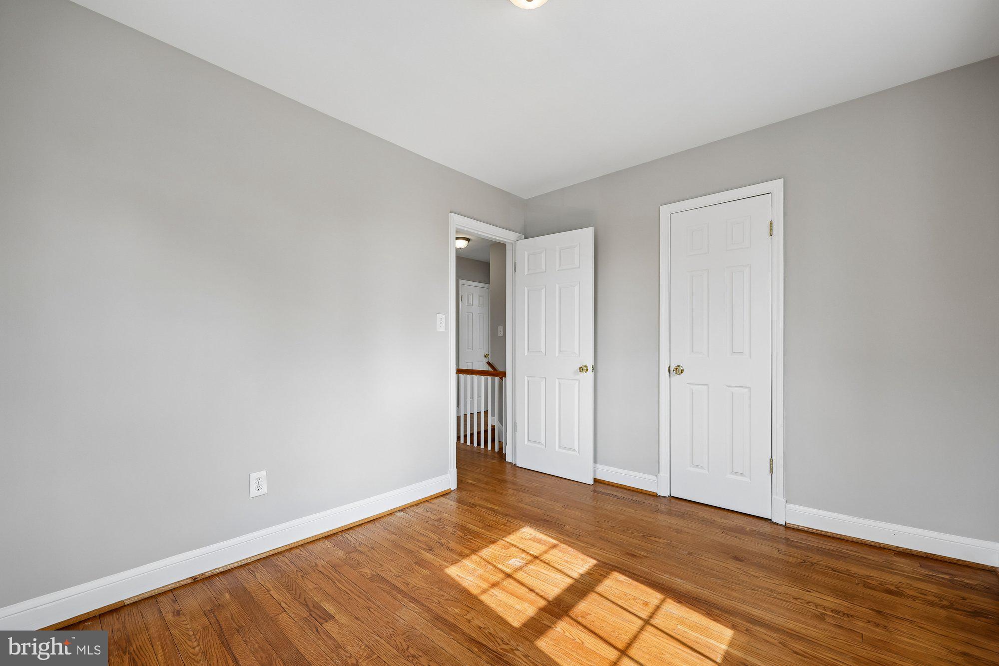 2613 Elnora Street Silver Spring, MD 20902 - Photo 25 of 54 a view of an empty room and wooden floor