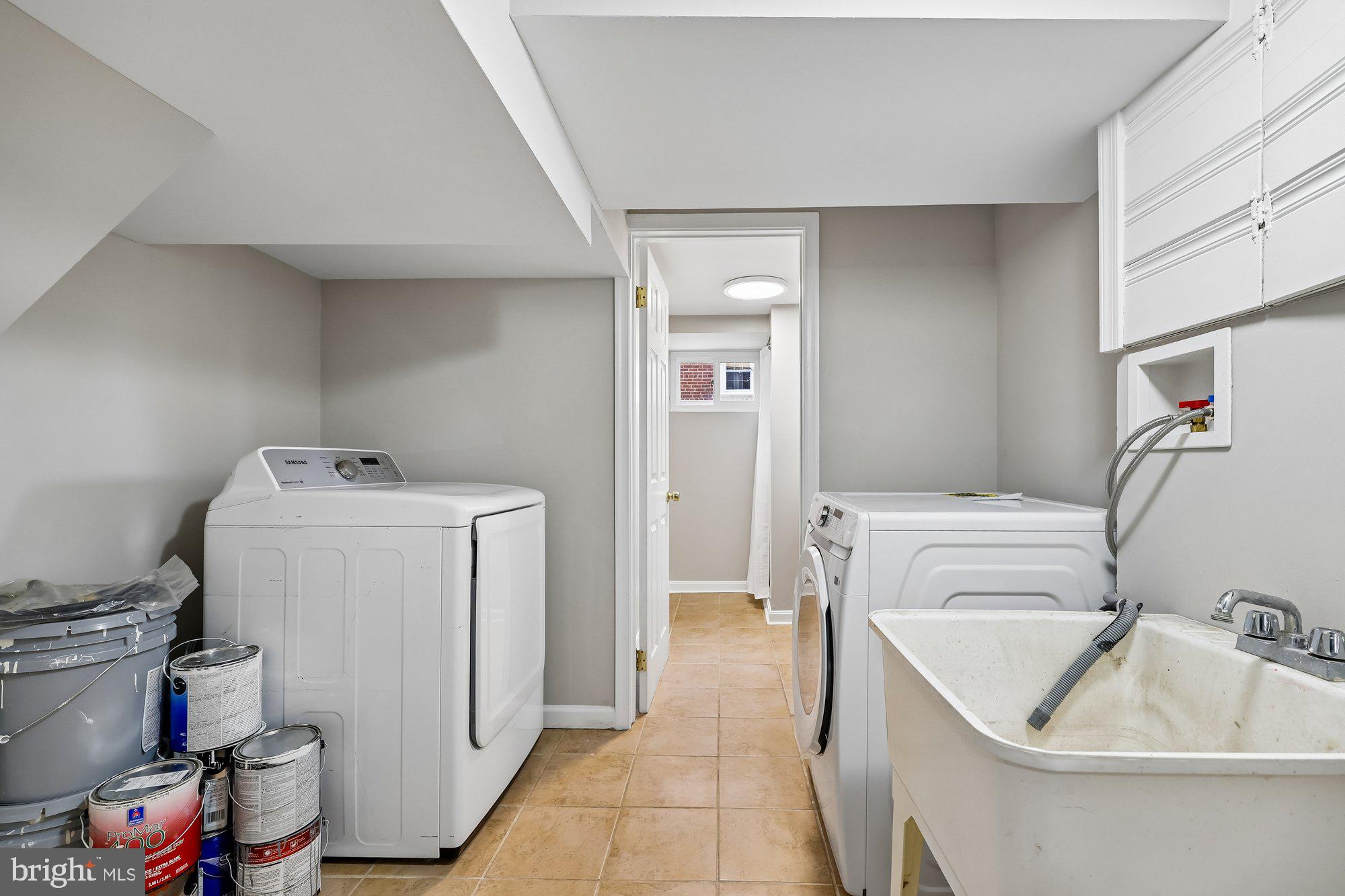 2613 Elnora Street Silver Spring, MD 20902 - Photo 35 of 54 a utility room with dryer and washer