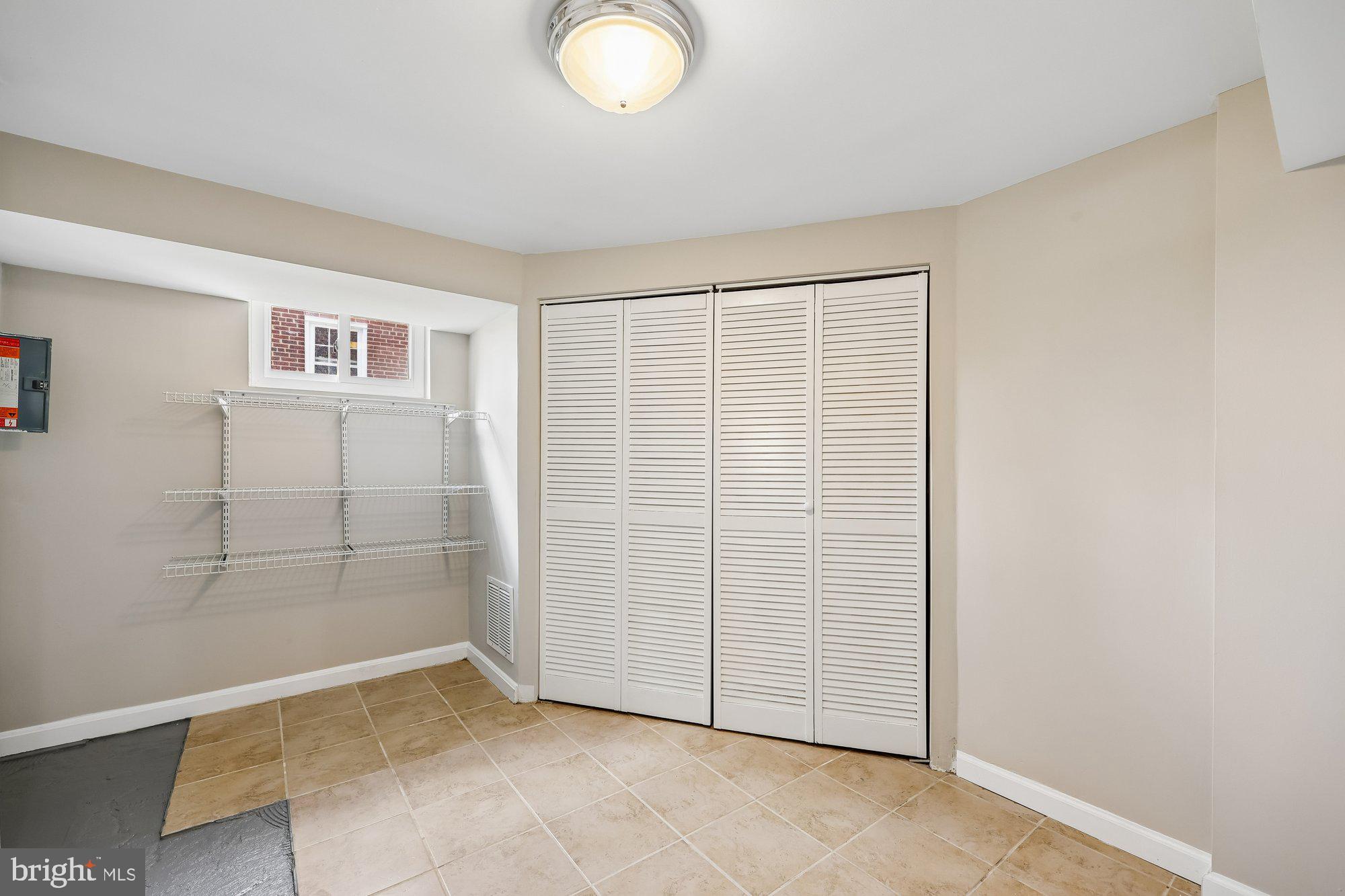2613 Elnora Street Silver Spring, MD 20902 - Photo 36 of 54 an empty room with closet