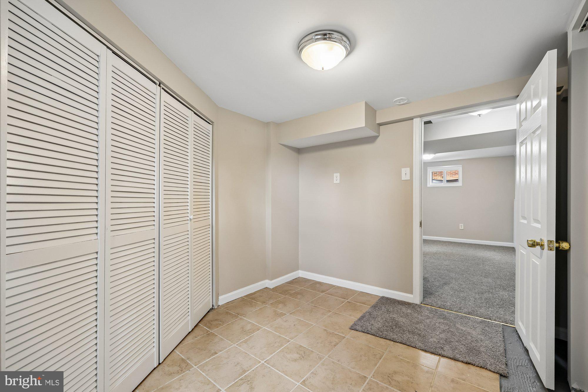 2613 Elnora Street Silver Spring, MD 20902 - Photo 37 of 54 a view of a walk in closet