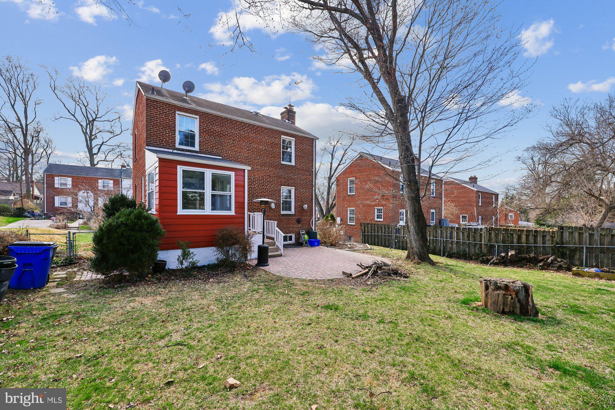 2613 Elnora Street Silver Spring, MD 20902 - Photo 41 of 54 a view of backyard with a garden and outdoor seating
