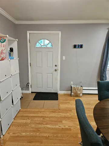 a bedroom with a bed and a chair