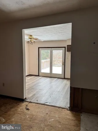 an empty room with windows