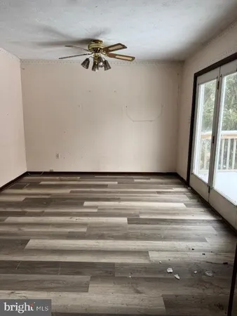 a view of a room with stairs and a rug