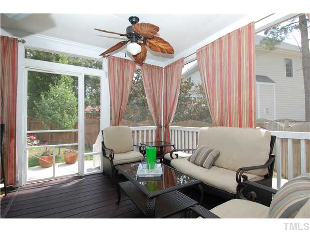 6101 Tiffield Way Wake Forest, NC 27587 - Photo 22 of 25 a living room with furniture and a large window
