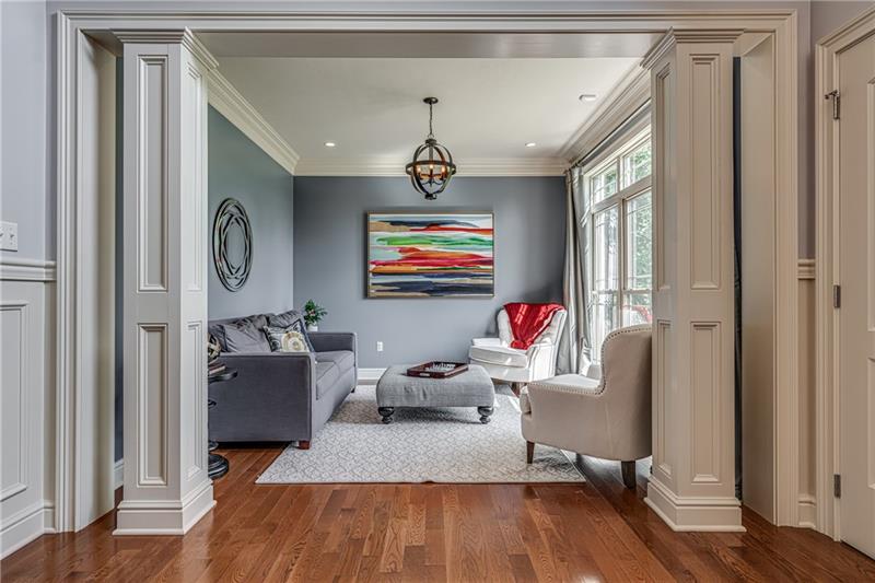 306 Buckingham Drive Venetia, PA 15367 - Photo 3 of 25 To the right of the front door is this lovely sitting/living room. This is a great area for your grand piano or music room.