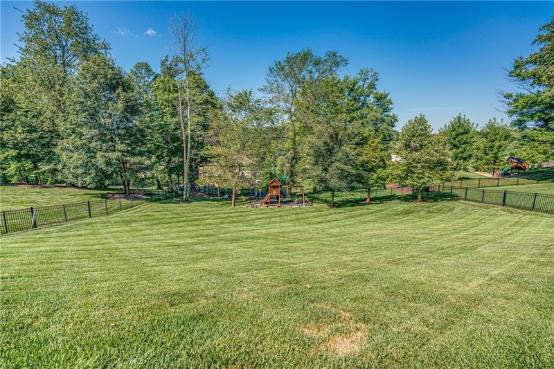 306 Buckingham Drive Venetia, PA 15367 - Photo 24 of 25 Look at this incredible fenced in backyard! Enjoy spending endless hours running and playing.