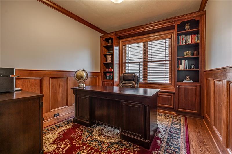 306 Buckingham Drive Venetia, PA 15367 - Photo 8 of 25 A quiet executive office on the first floor that is tucked away down a hall. Beautiful built in wood bookcases and wood trim throughout.