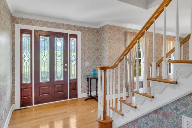 a view of an entryway with staircase