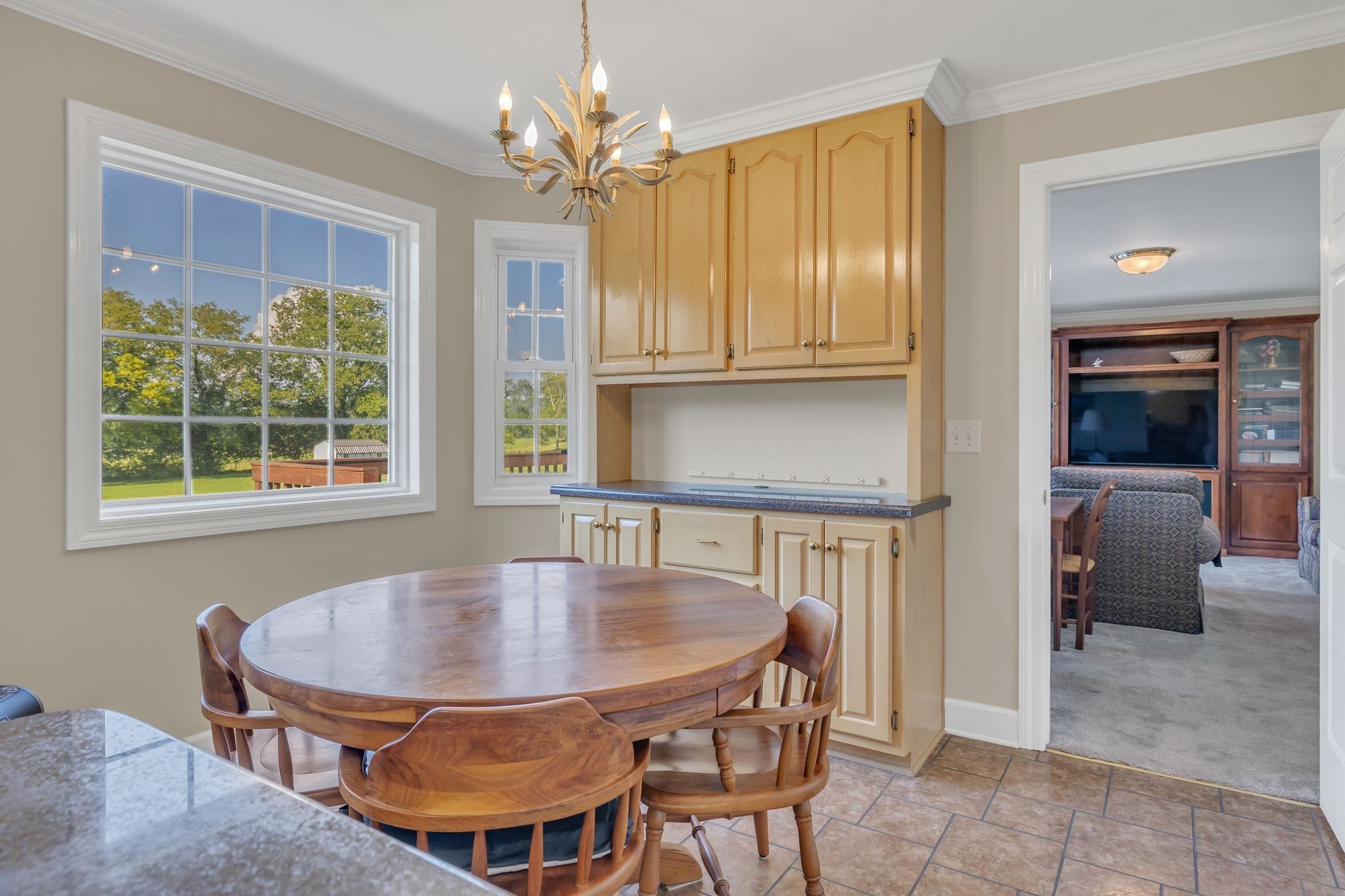 207 Sugar Tree Lane Pulaski, TN 38478 - Photo 18 of 30 a view of a dining room with furniture window and wooden floor