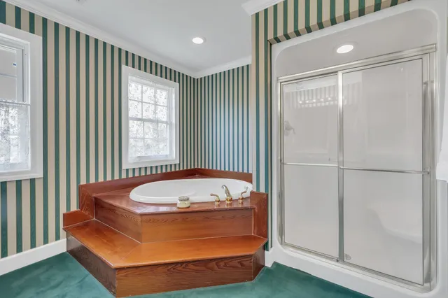 a room with a bed and a window