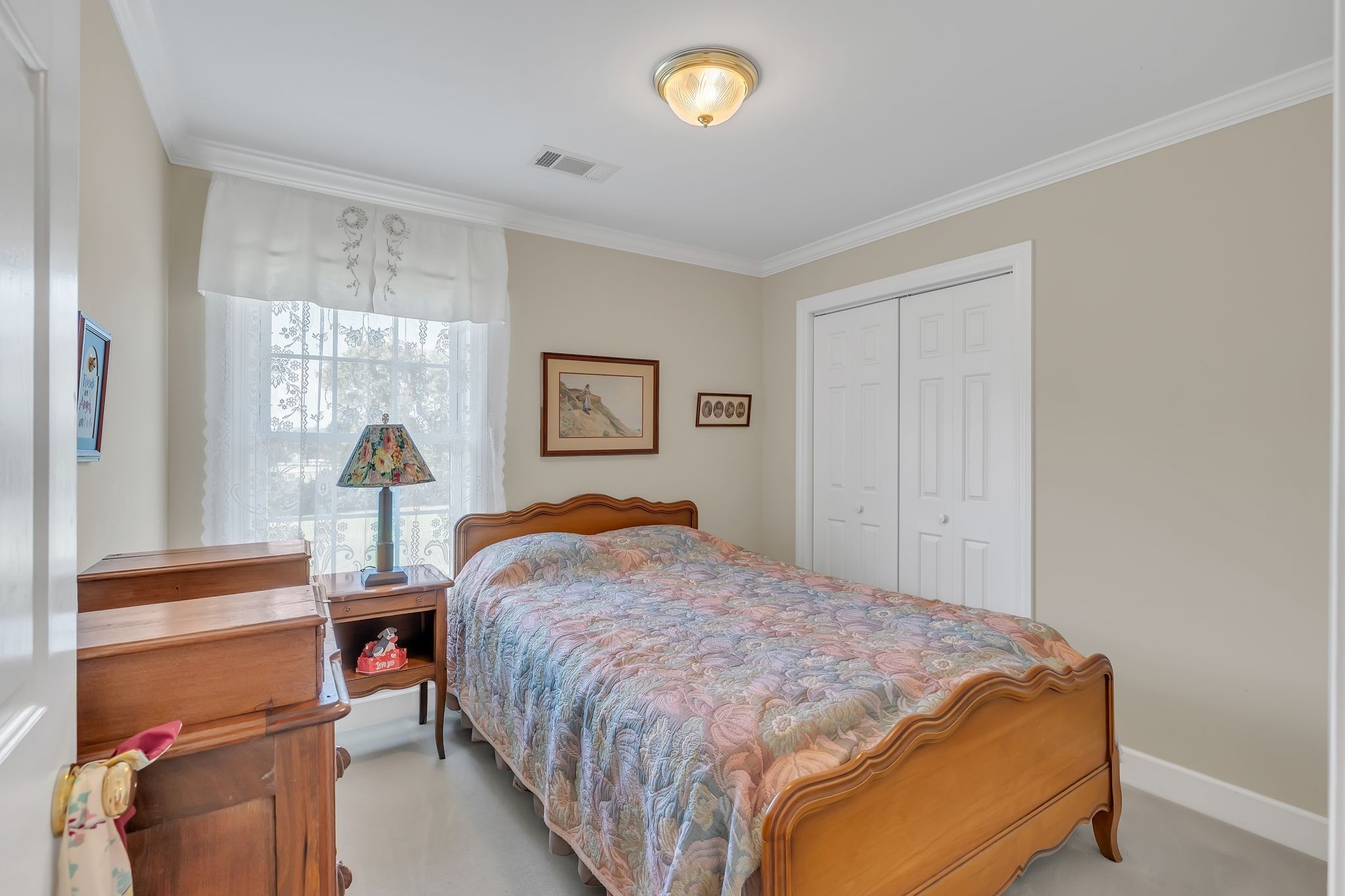 207 Sugar Tree Lane Pulaski, TN 38478 - Photo 29 of 30 a bedroom with a bed and window