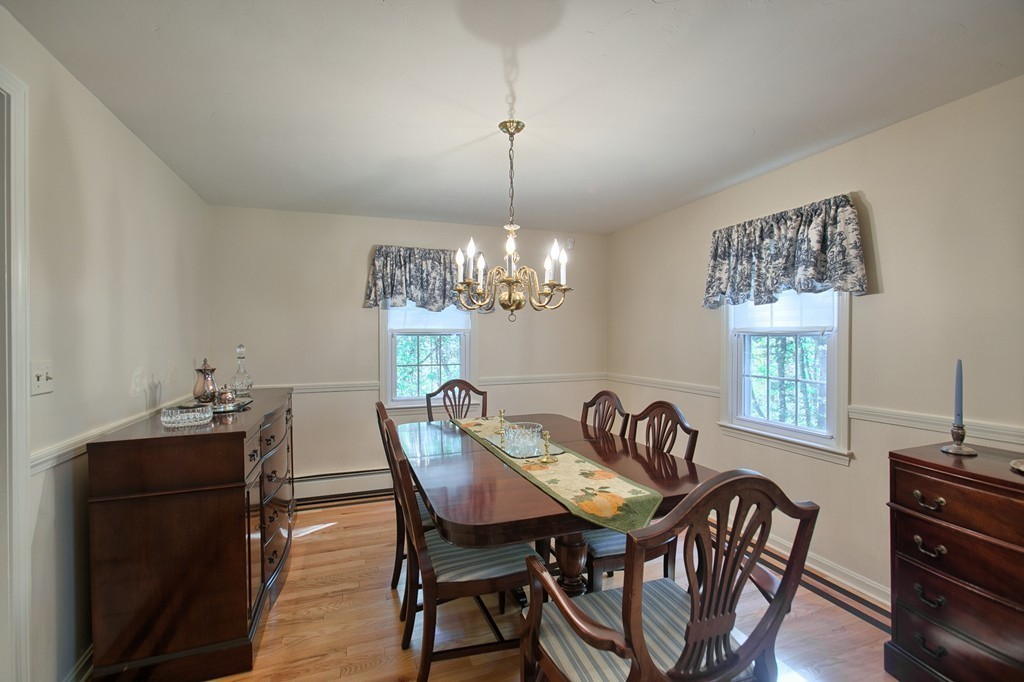 25 Autumn Road Lunenburg, MA 01462 - Photo 11 of 26 a view of a dining room with furniture and chandelier