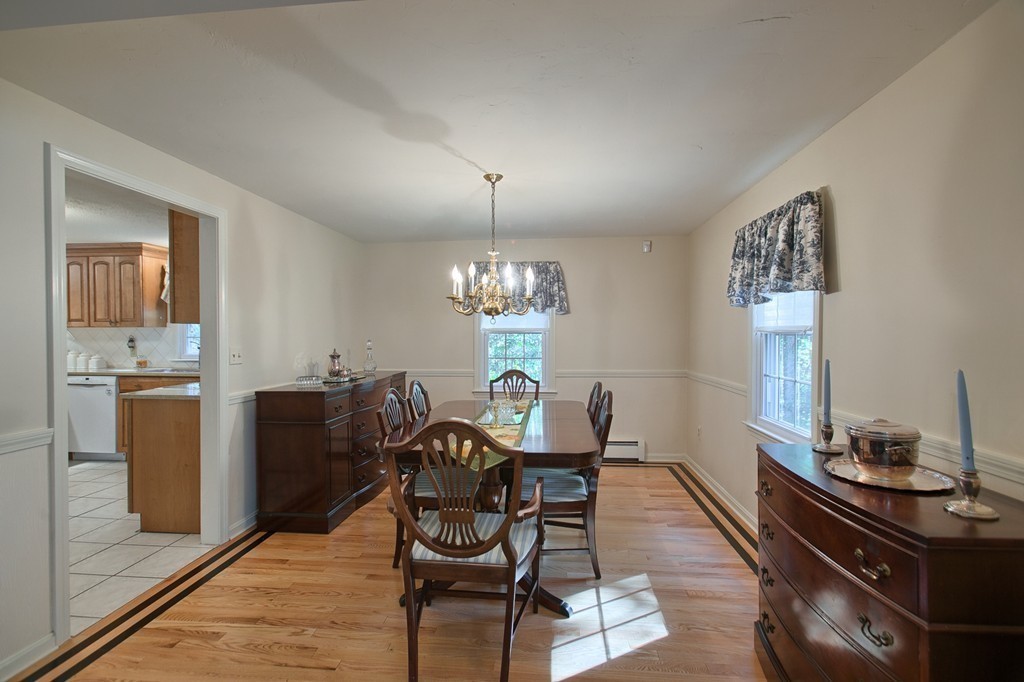 25 Autumn Road Lunenburg, MA 01462 - Photo 12 of 26 a view of a dining room with furniture window and wooden floor